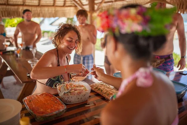 Guests helping themselves to salads at the barbecue lunch table